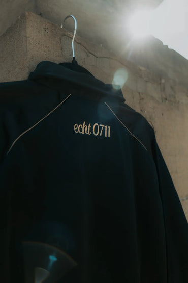 Trainingsjacke "Gold", schwarz